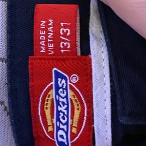 dark blue and black womans dickies